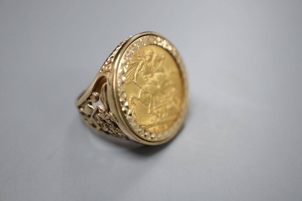 A George V 1912 gold sovereign, now in 9ct gold ring mount, size Q, gross 14.1 grams.